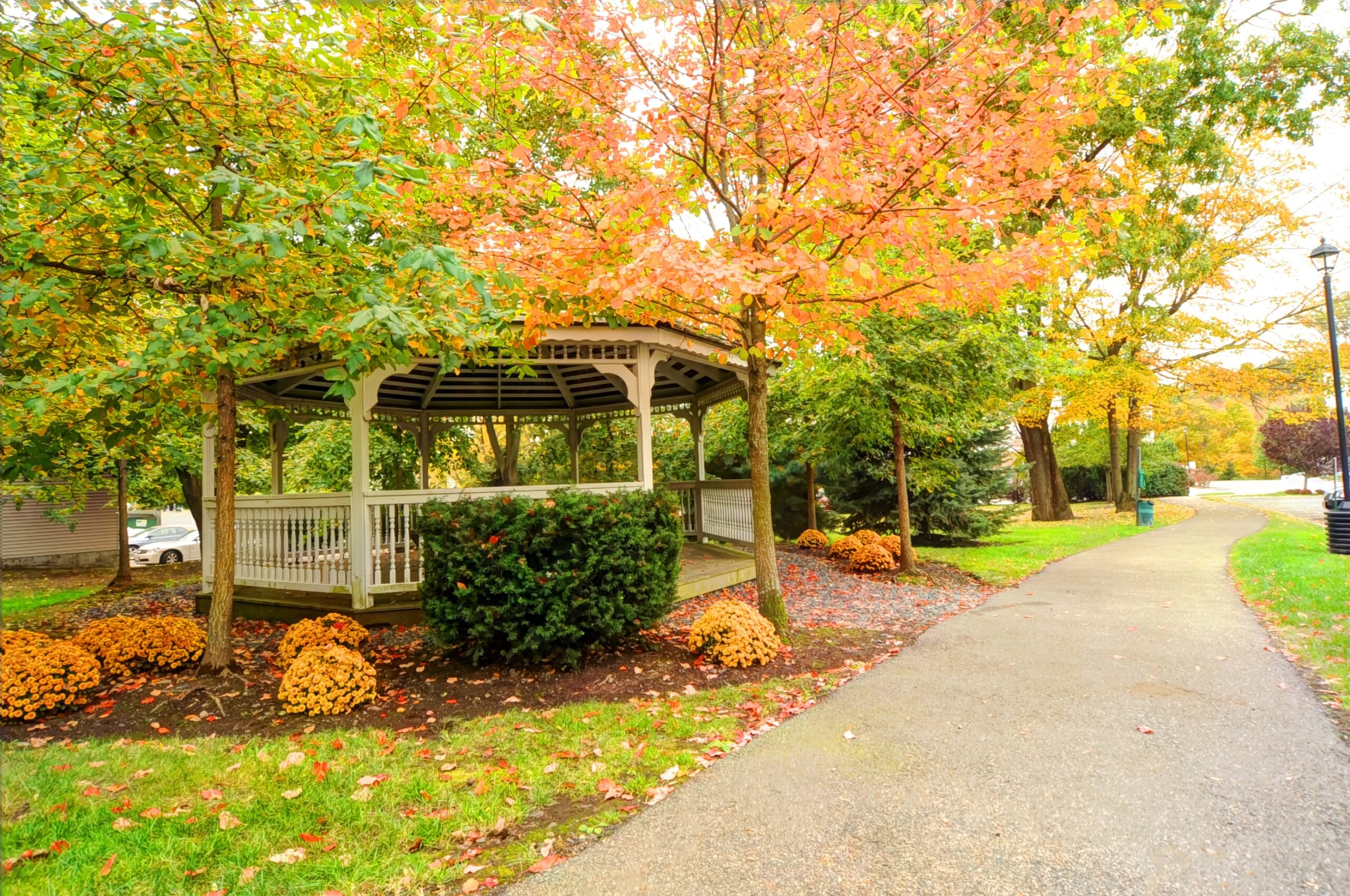 The community gazebo and wooded grounds at Chestnut Park Apartments in North Attleboro, Massachusetts.