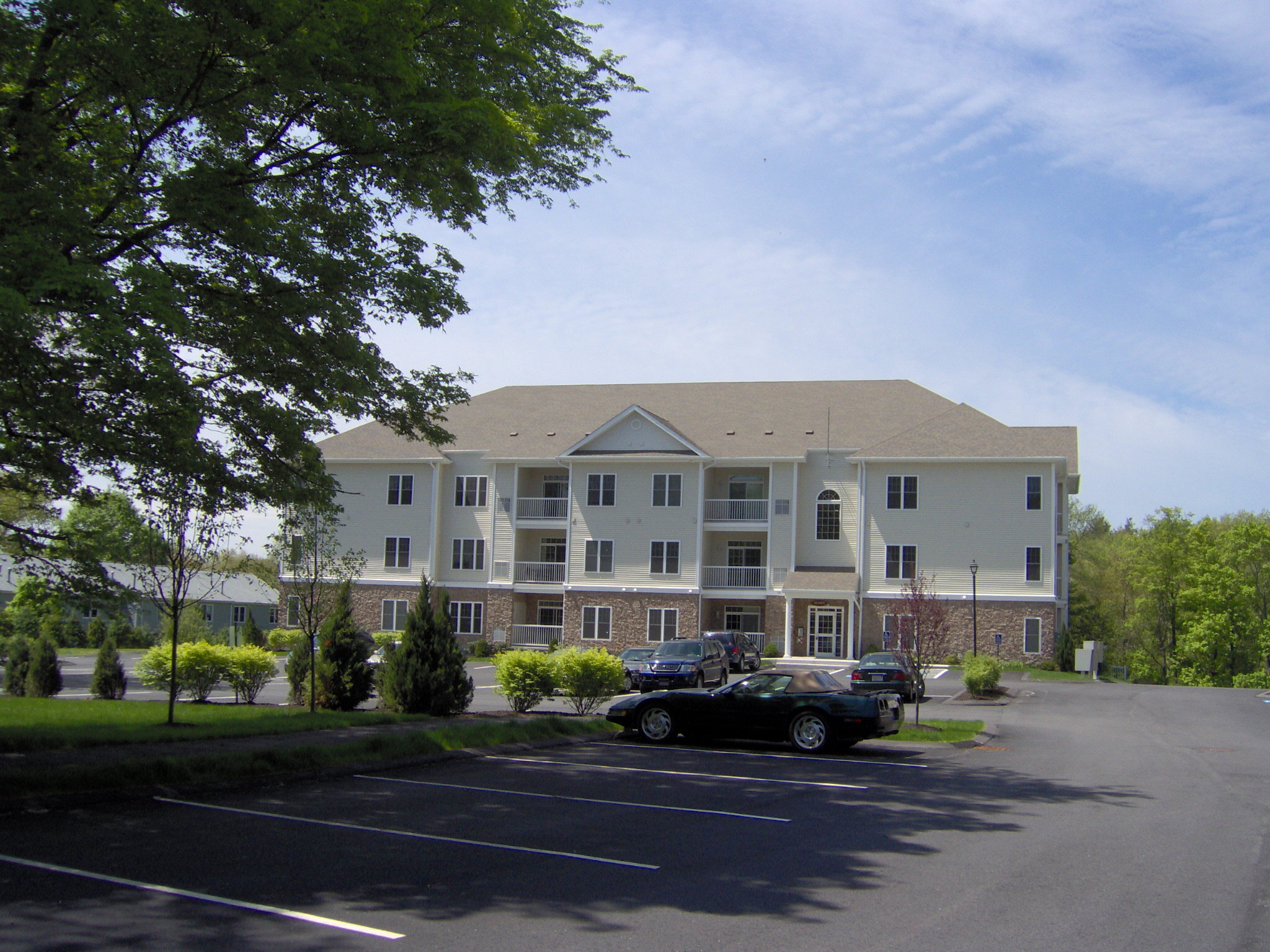 A residential building and the landscaped grounds at Chestnut Park Apartments in North Attleboro.